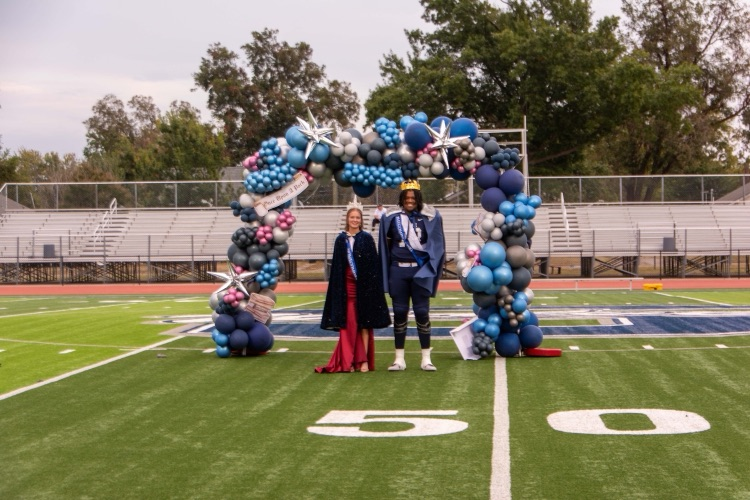 homecoming king and queen on fidldfield