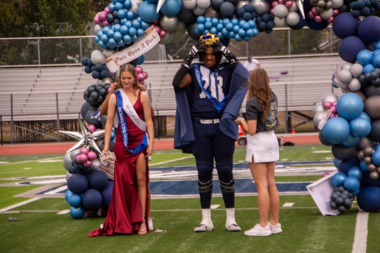 king and Queen being crowned 