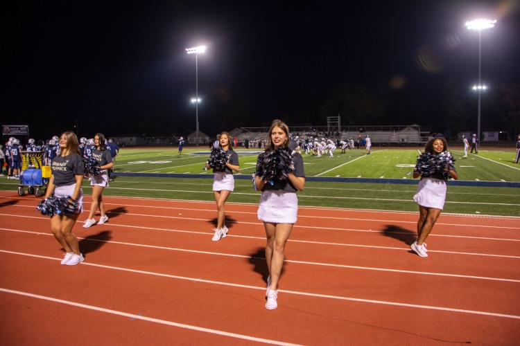 cheerleader on sideline