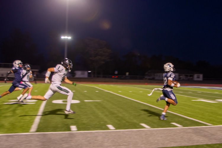 football player running 