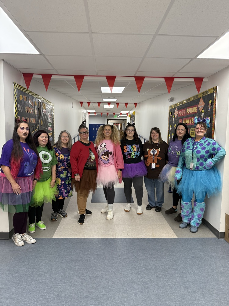 adults dressed like monsters