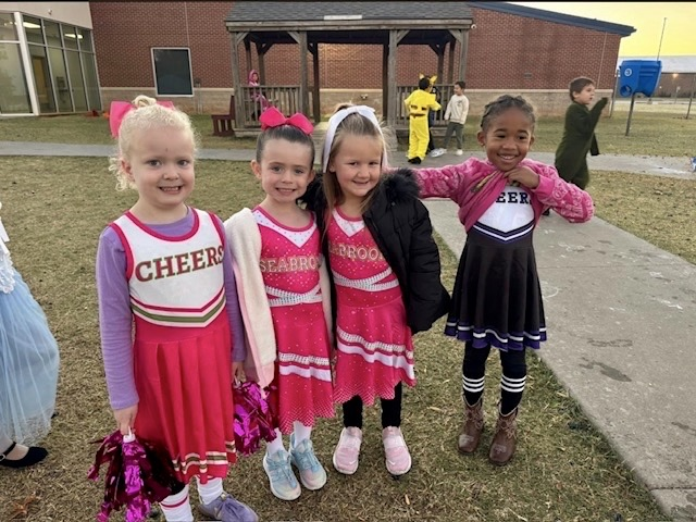 little girls dressed like cheerleaders 