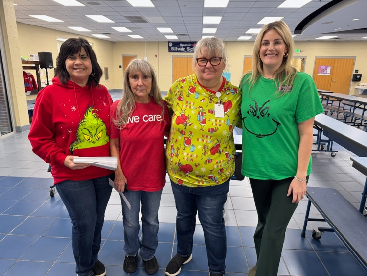group of adults smiling 