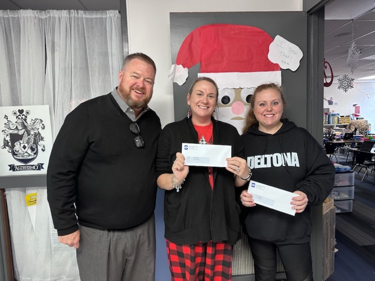 group of adults smiling 