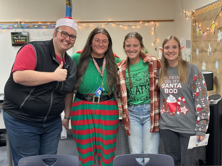 group of adults smiling 