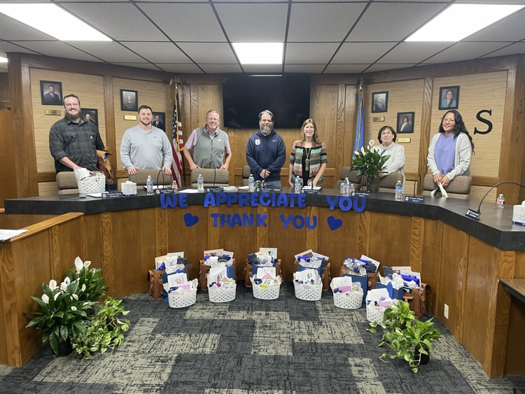 group of adults in board room