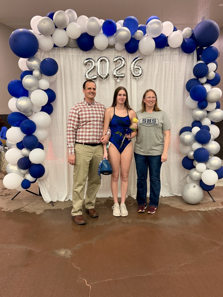 swimmer with parents