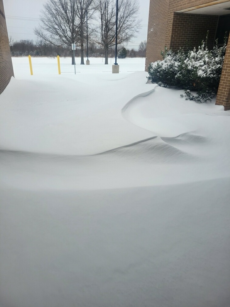snow in between buildings 