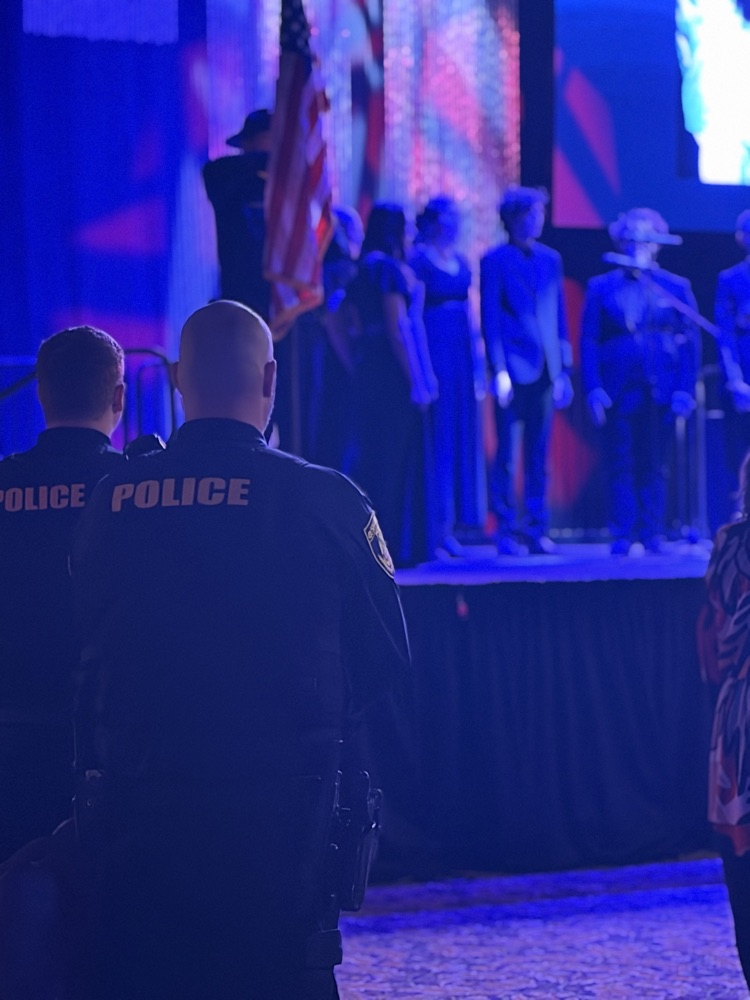 students singing on stage 
