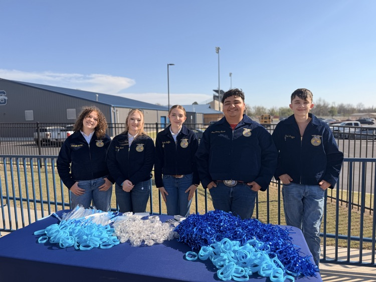 five FFA students in blue jacket
