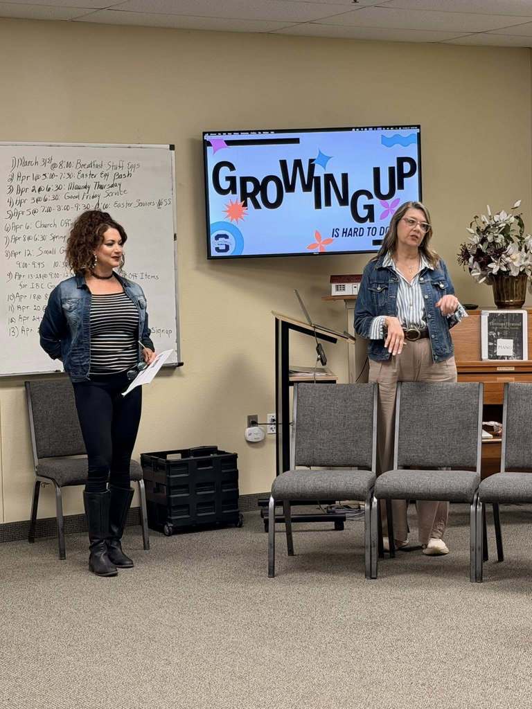 two women presenting powerpoint