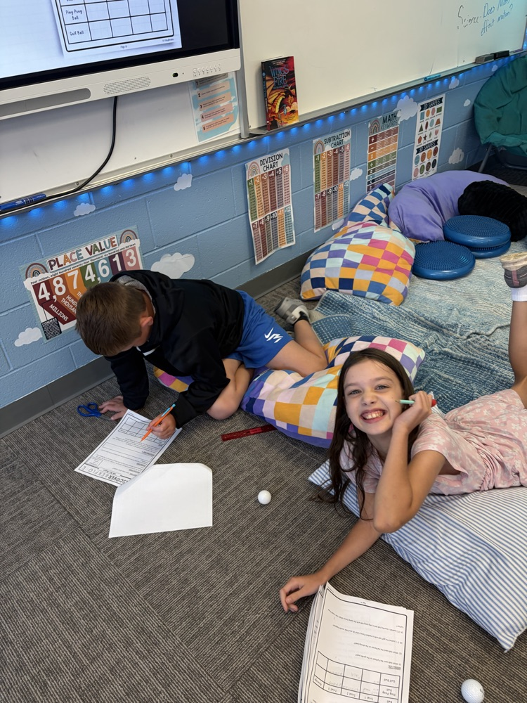 students recording data