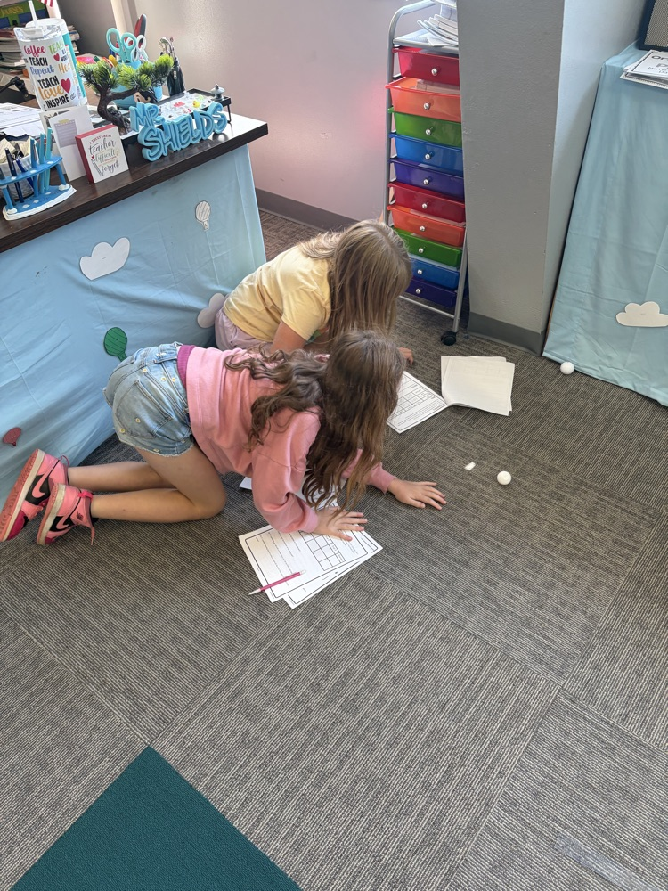 students recording data