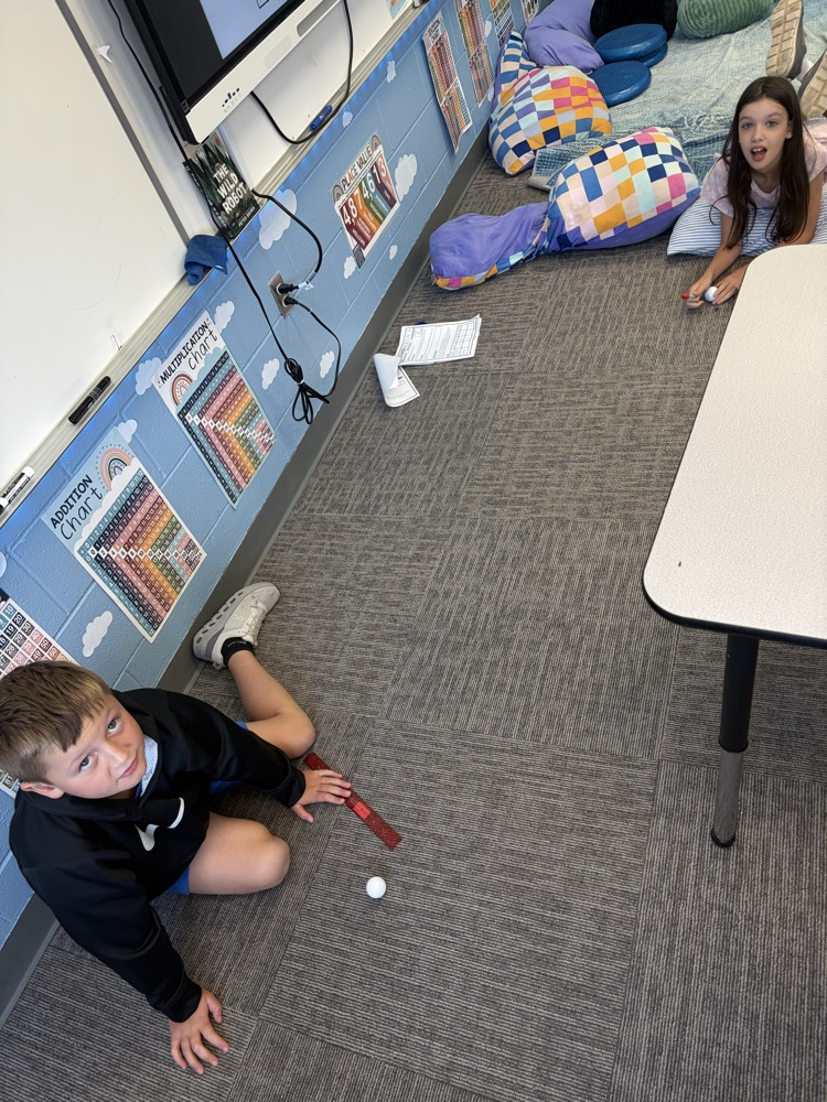 students measuring distance