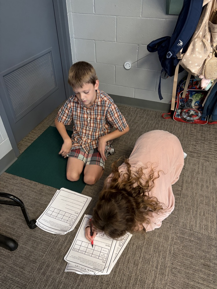 students recording data