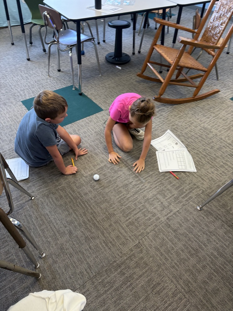 students recording data