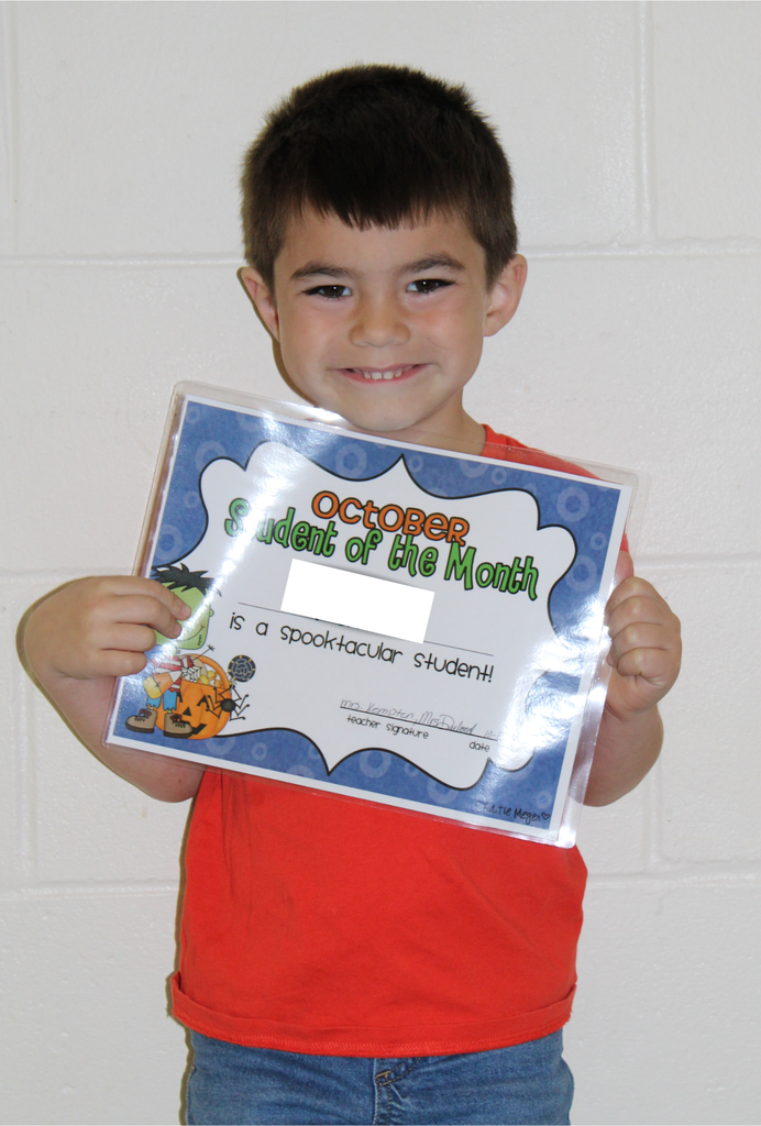 student holding certificate