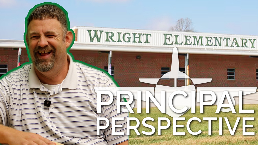 a thumbnail photo of Mr Green photoshopped in front of Wright Elementary.