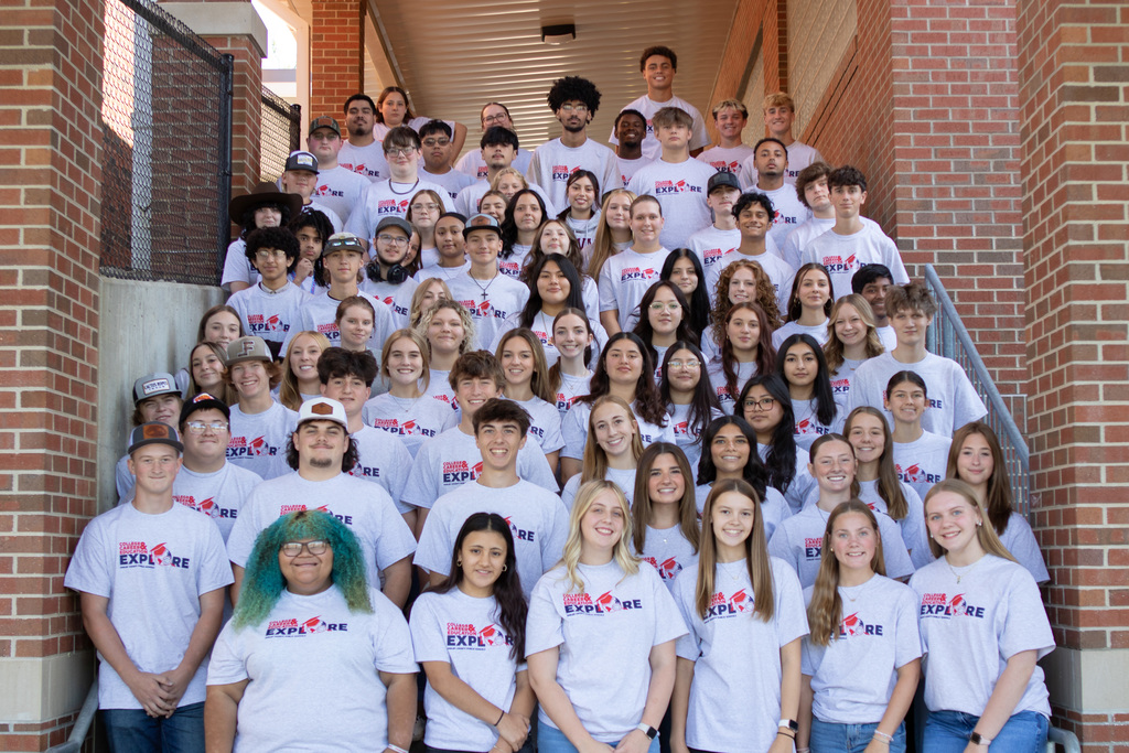 A group photo of the CTE ambassadors gathered on an outdoor staircase