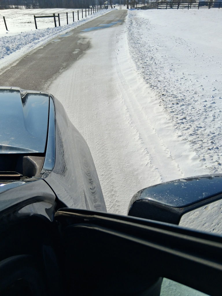 a snow road conditions photo from January 27th, 2026