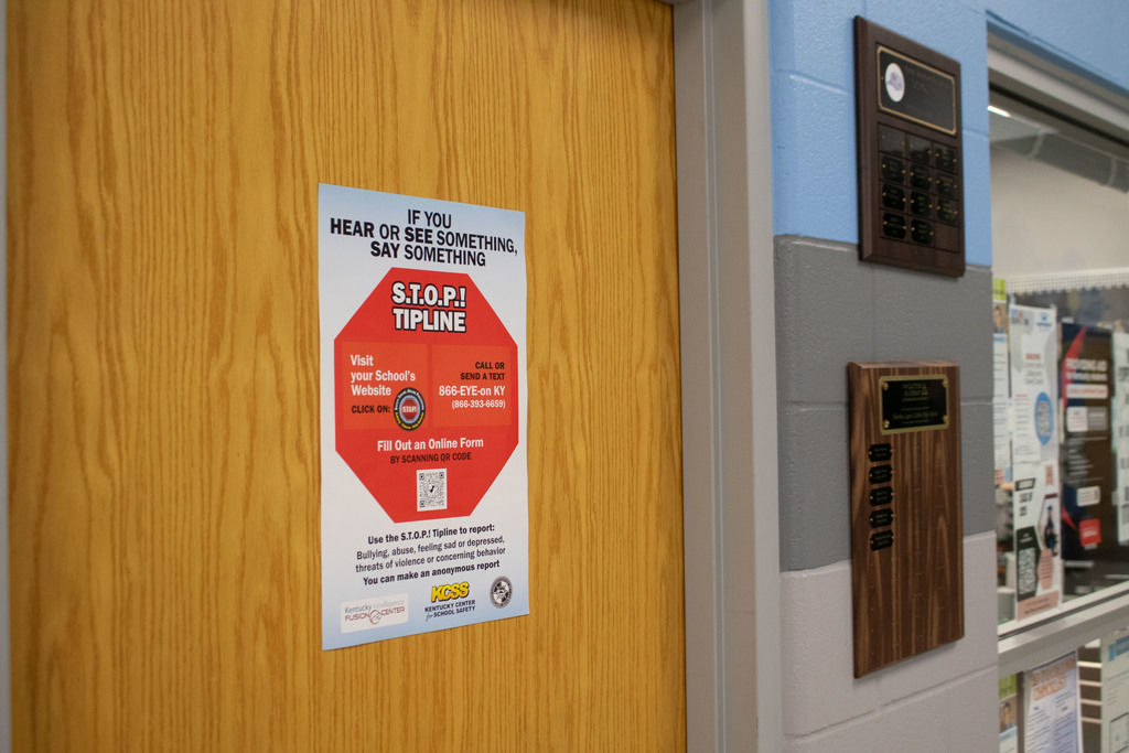a flyer for the STOP Safety Tipline hanging in MLCHS