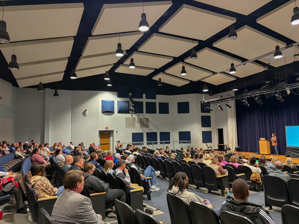SCPS staff listening to the presentation