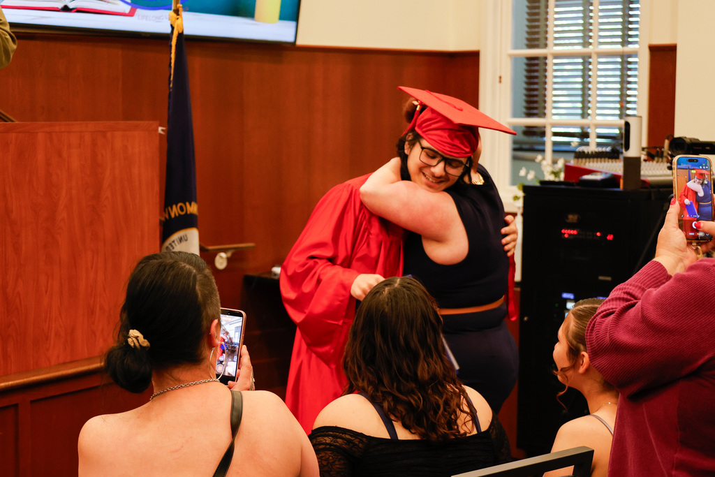 Family congratulating the graduate