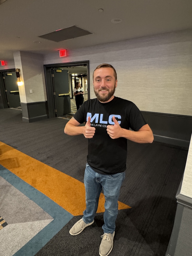 MLCHS Band Director Grant Gartland posing for a pic at the conference