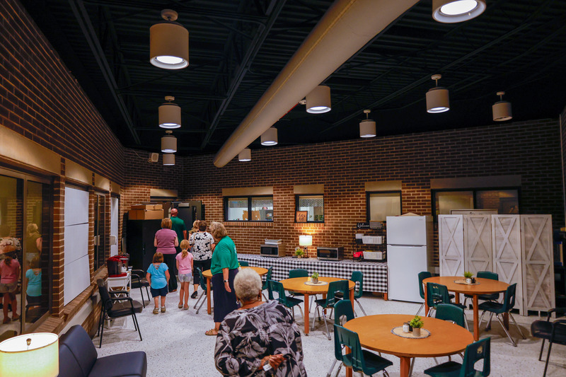 a tour walking through the new teacher's lounge, previously the courtyard