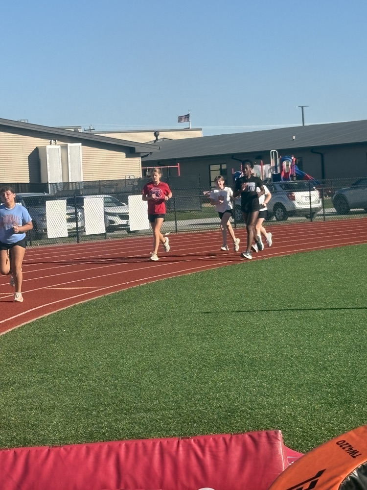 encouraging each other as we do laps on the track