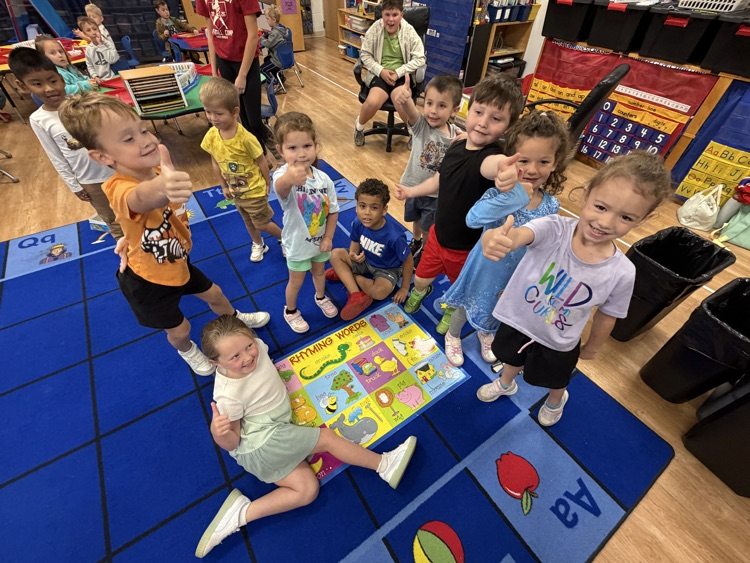 Students in Mrs. Larrick's class work together to complete a puzzle