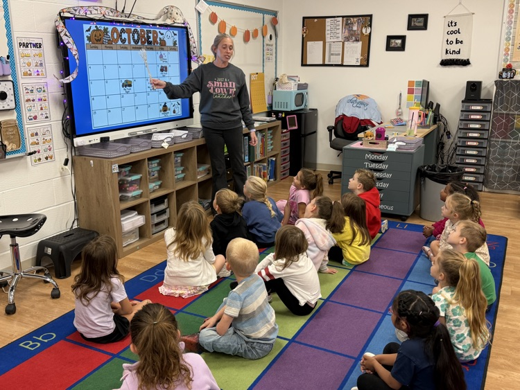 Students in Mrs. Turnage's class learn the days of the week during calendar time.