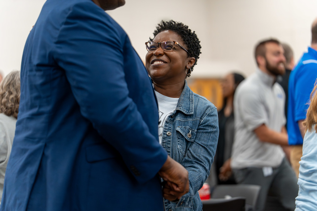 Shelby County Schools' employees interacting.