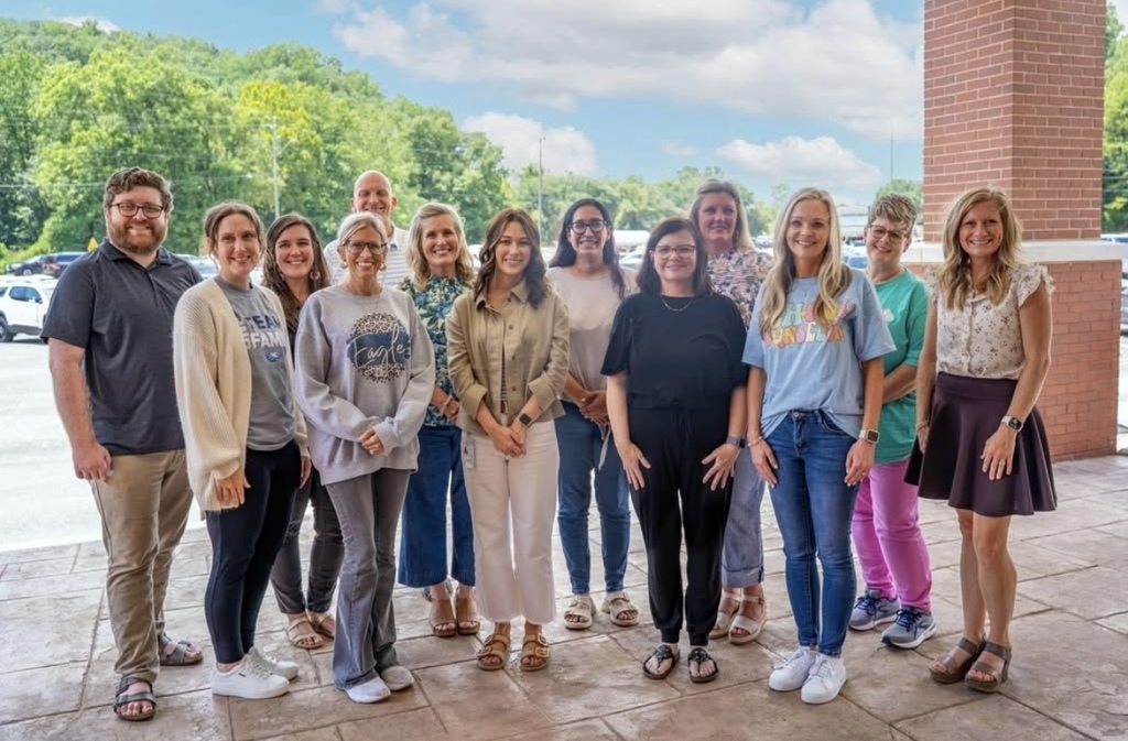 school counselors standing together  in a photo while their programs are being recognized as Shelby County  School Counseling Programs of Distinction
