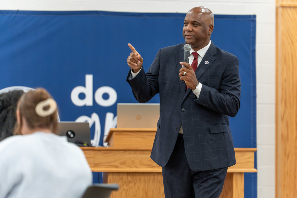 Dr. Brooks addresses the new team members.