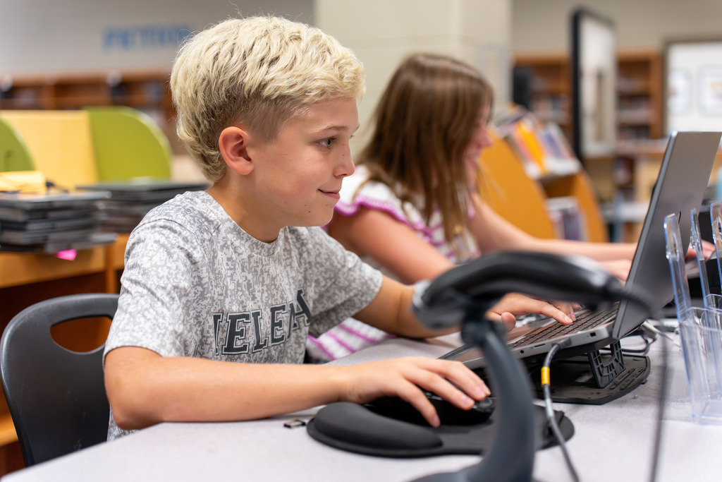 Student works on his laptop.