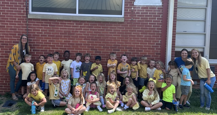 students and teachers wearing yellow