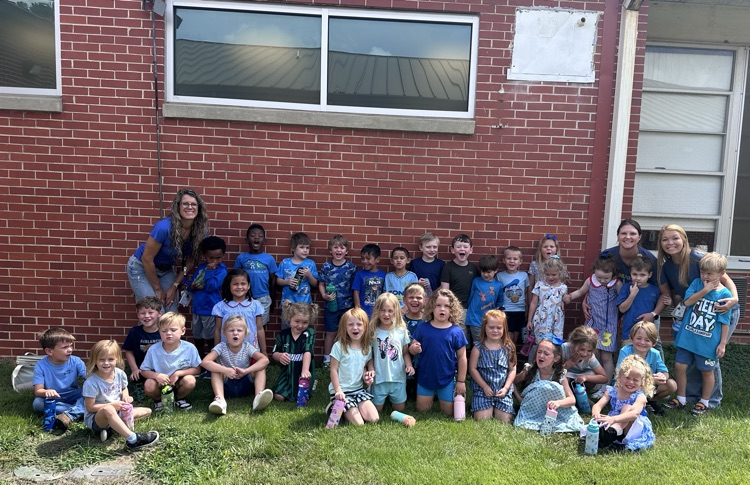 students and teachers wearing blue
