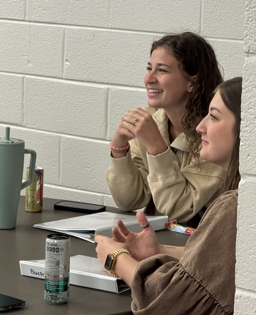 First Year Teacher Academy participants listening to session