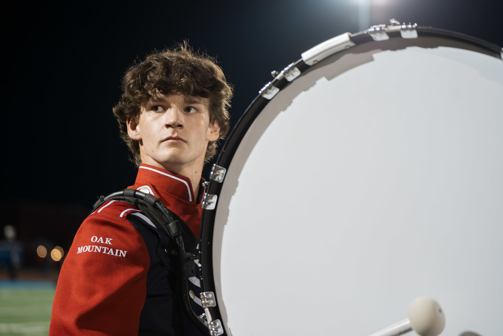 Bass drum player warming up.