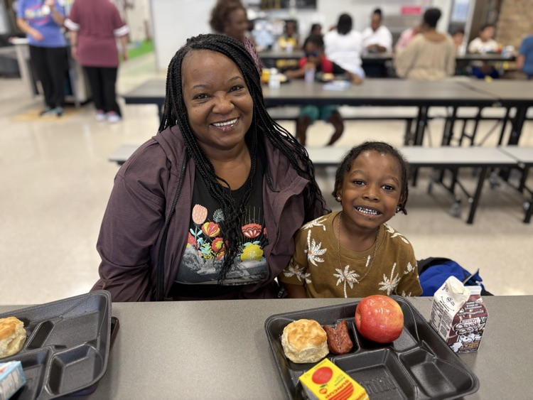 grandmother and grandson at breakfast