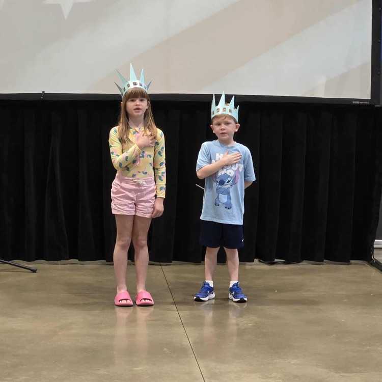 students leading the pledge of allegiance 