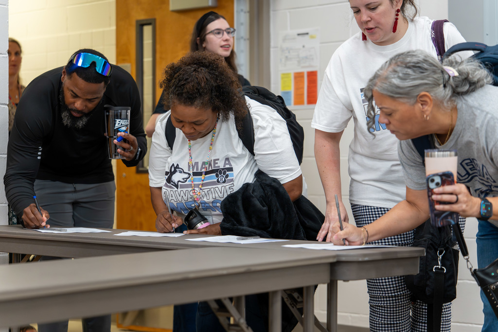 Individuals sign-in upon arriving at CSI.
