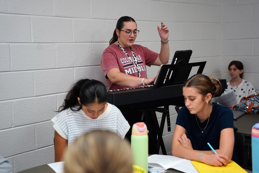 Students rehearsing for All State Choir 