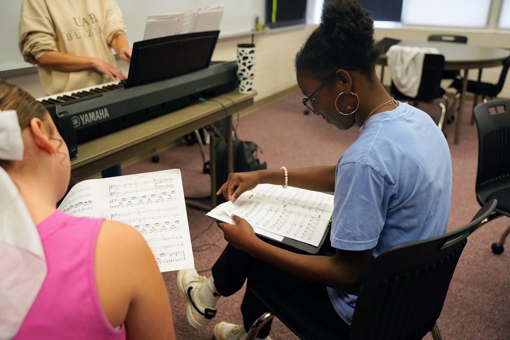 Students rehearsing for All State Choir 