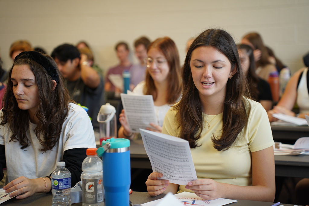 Students rehearsing for All State Choir 