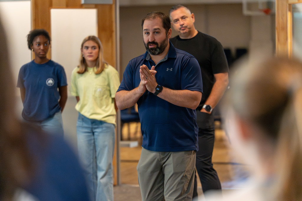 John Milton addresses his students at the Leadership Conference.