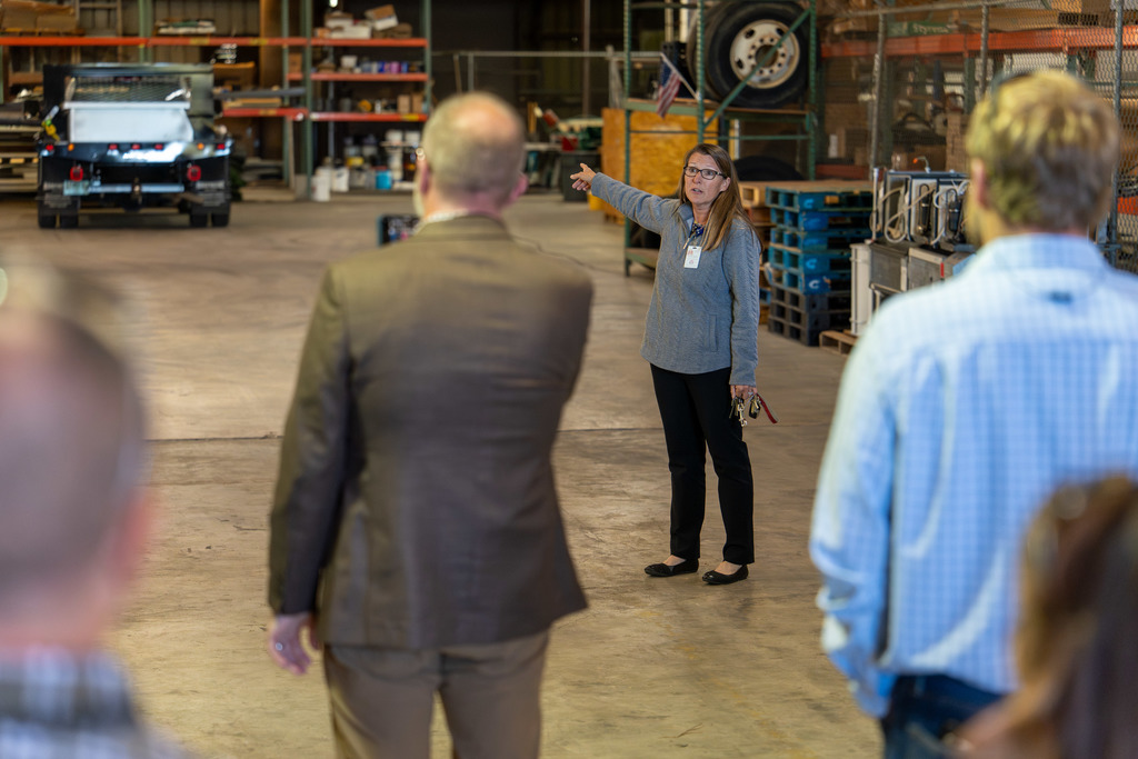 Ms. Snyder serving as a guide to the Shelby 101 class at the maintenance warehouse.