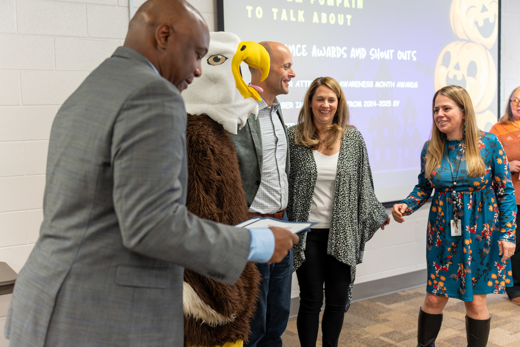 Oak Mountain administrators are recognized.