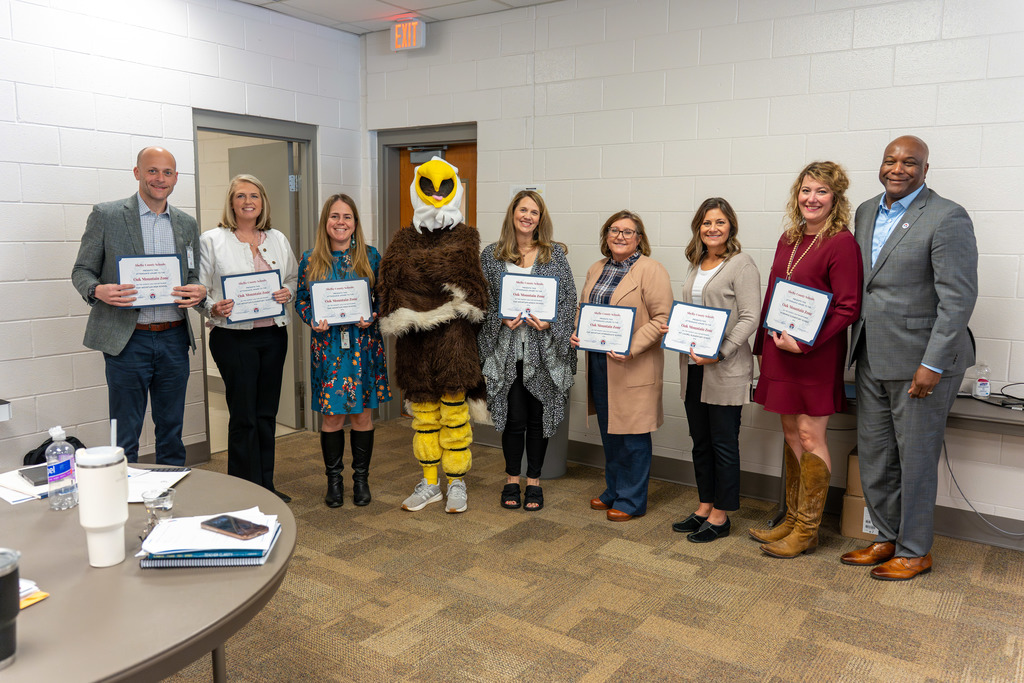 Oak Mountain administrators are recognized.